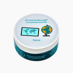 Aromadough Aromatherapy Stress Ball packaging with 'Focus' text and graphics on a white background